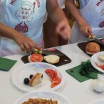 Los más pequeños también cocinan en la Feria Internacional del Ajo