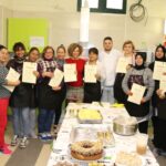Trece mujeres de países diferentes realizan un curso de cocina española en Manzanares